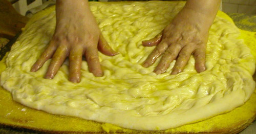 Focaccia alla genovese fatta a mano Focaccia alla genovese fatta a mano